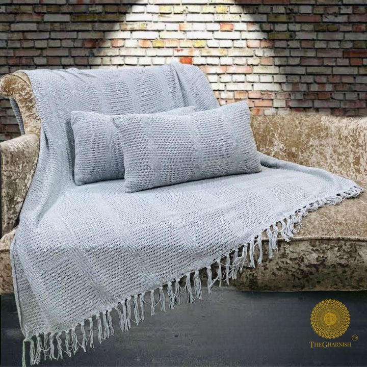 Textured knitted throw and pillow set by The Gharnish featuring super soft, lightweight cushions in cozy, stylish design.
