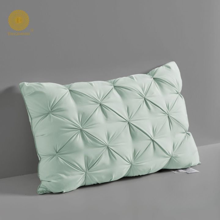 Pair of white feathery super soft cushions by The Gharnish, showcasing plush, comfortable cushions with fluffy, inviting texture.