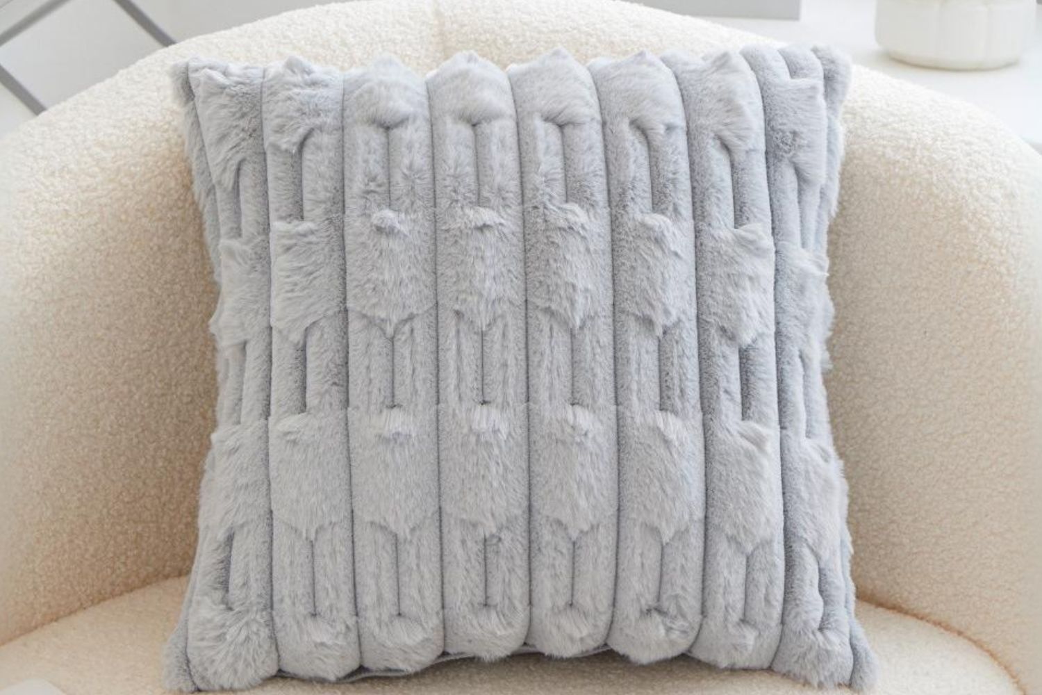 Set of two white rabbit fur cushion covers by The Gharnish, soft plush cushions for cozy home decor.