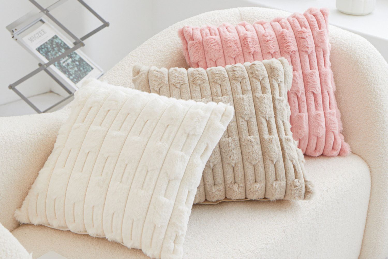 Set of two white rabbit fur cushion covers by The Gharnish, soft and plush decorative cushions for home decor.