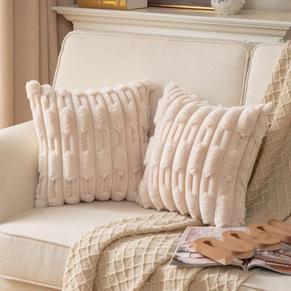 Set of two white rabbit fur cushion covers by The Gharnish, soft plush decorative cushions for sofa or chair.