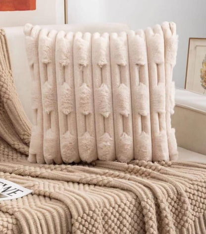 Set of two white rabbit fur cushion covers by The Gharnish, soft and plush decorative cushions for living spaces.