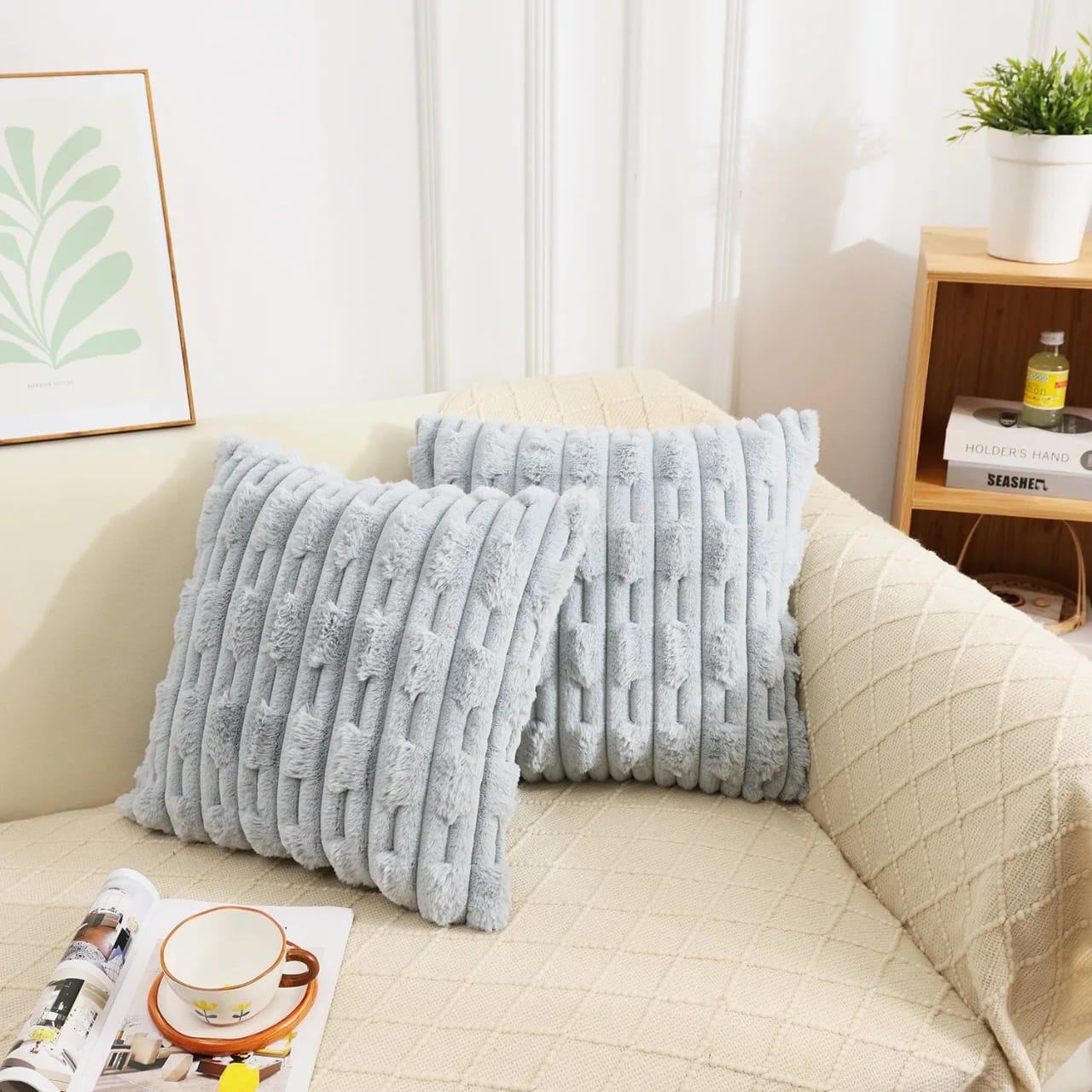 Set of two white rabbit fur cushion covers by The Gharnish, soft and plush decorative cushions for home decor.