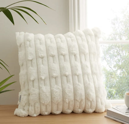 Set of two white rabbit fur cushion covers by The Gharnish, soft and plush decorative cushions for living room or bedroom.