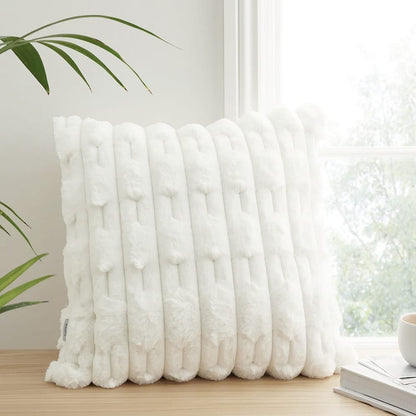 Set of two white rabbit fur cushion covers by The Gharnish, soft and plush for cozy home decor.