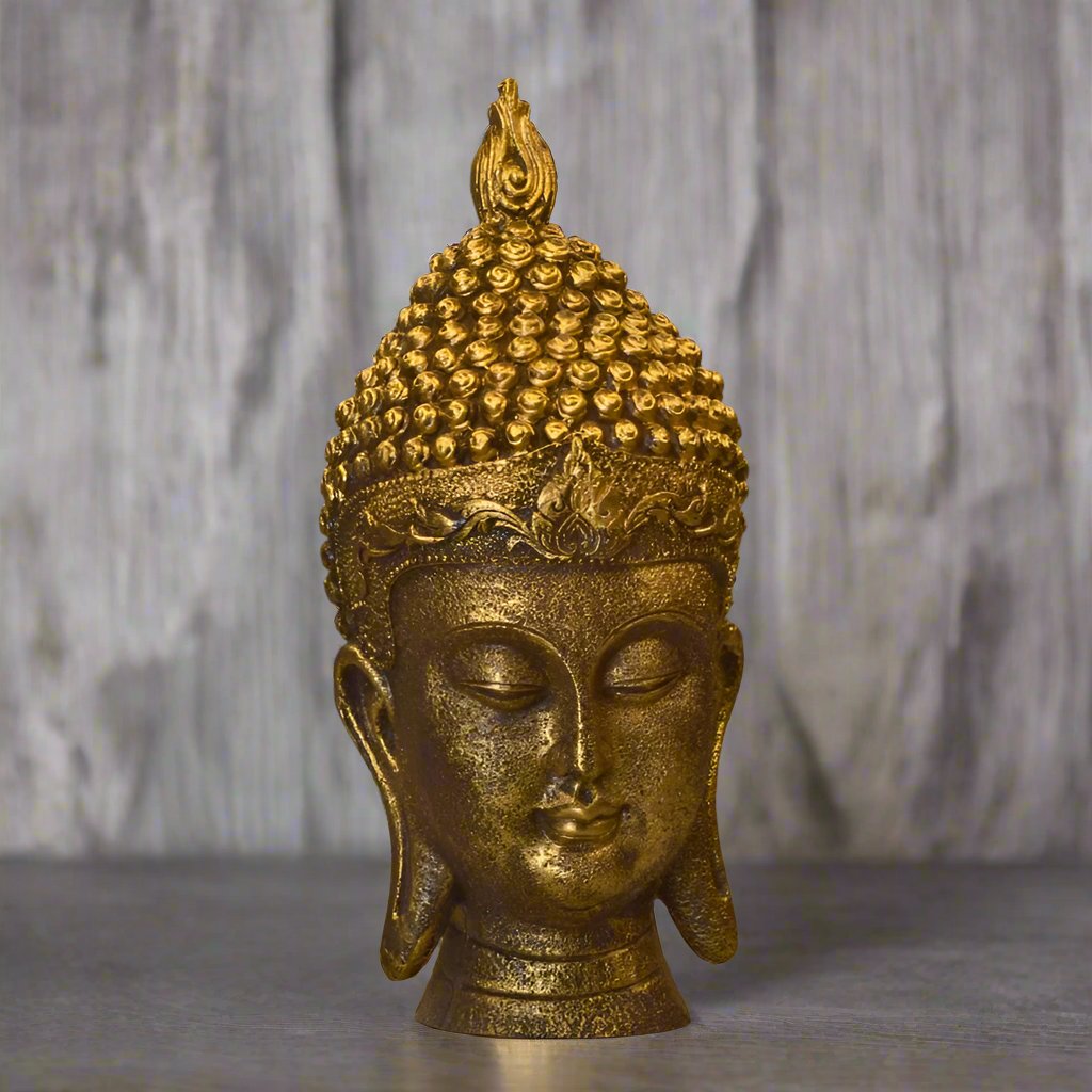 Golden Buddha face figurine by The Gharnish, decorative God’s face showpiece for home and office Vastu, detailed and serene design.