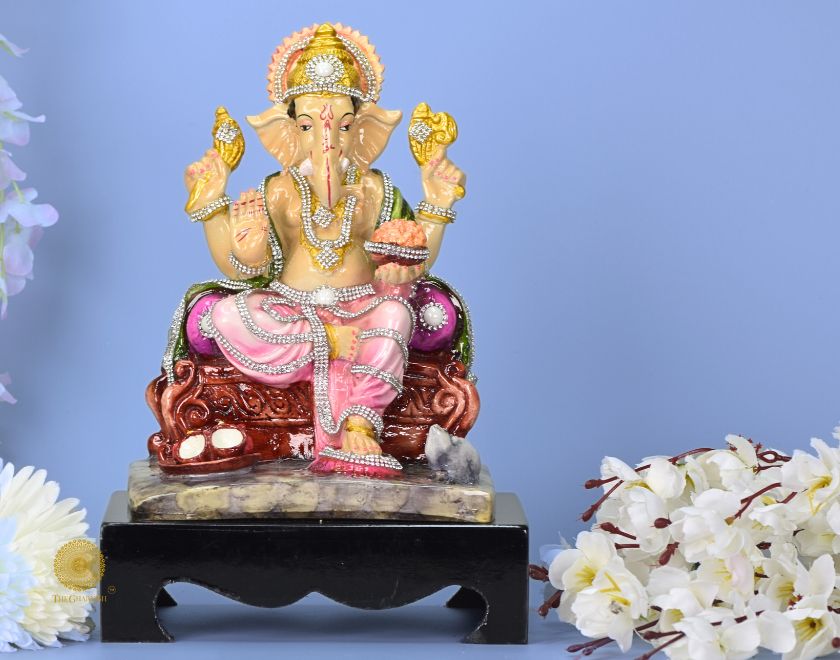 Multicolor Ganapati Ji Murti figurine by The Gharnish, depicting Lord Ganesha in vibrant hues and intricate details.
