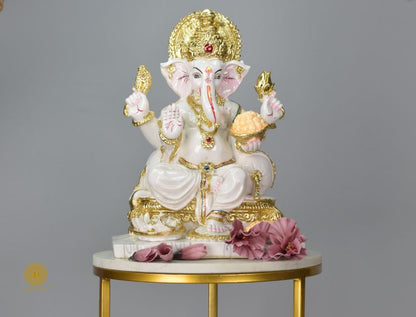 White marble look Ganesha god figurine by The Gharnish, detailed Hindu deity sculpture with intricate carvings and smooth finish.