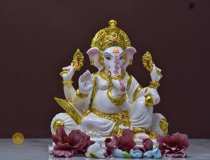 White marble Lord Ganesha statue, a detailed gods figurine with intricate carvings, ideal for spiritual decor or worship.