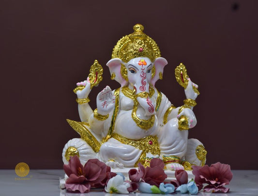 White marble Lord Ganesha statue, a detailed gods figurine with intricate carvings, ideal for spiritual decor or worship.
