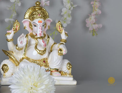 White marble Lord Ganesha statue, gods figurine by The Gharnish, showcasing intricate craftsmanship and sacred design.
