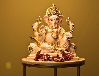 White marble Lord Ganesha figurine, a gods statue by The Gharnish, showcasing intricate craftsmanship and spiritual symbolism.