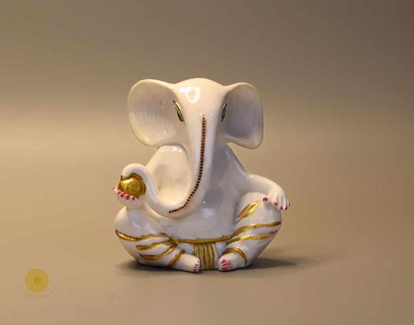 Left side view of The Gharnish Vaastu Ganesha statue, a detailed gods figurine showcasing intricate craftsmanship.