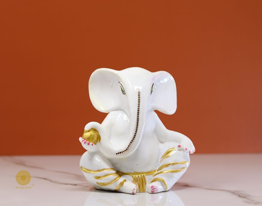 Left side view of The Gharnish Vaastu Ganesha statue, a detailed gods figurine perfect for home decor and spiritual harmony.