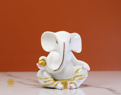 Left side view of The Gharnish Vaastu Ganesha statue, a detailed gods figurine perfect for home decor and spiritual harmony.