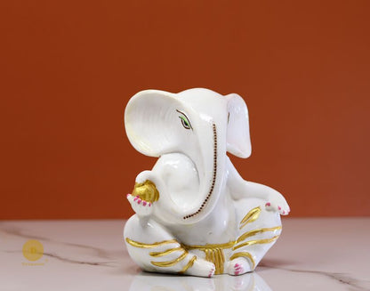 Left-side view of The Gharnish Vaastu Ganesha statue, a detailed gods figurine representing prosperity and good fortune.