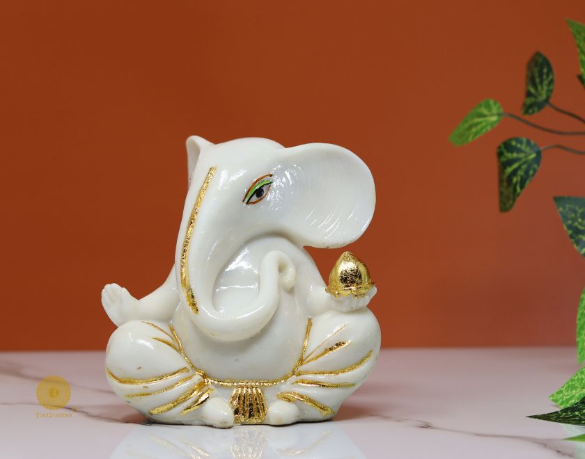 Left side view of The Gharnish Vaastu Ganesha statue, a detailed gods figurine with intricate design, suitable for home or office decor.
