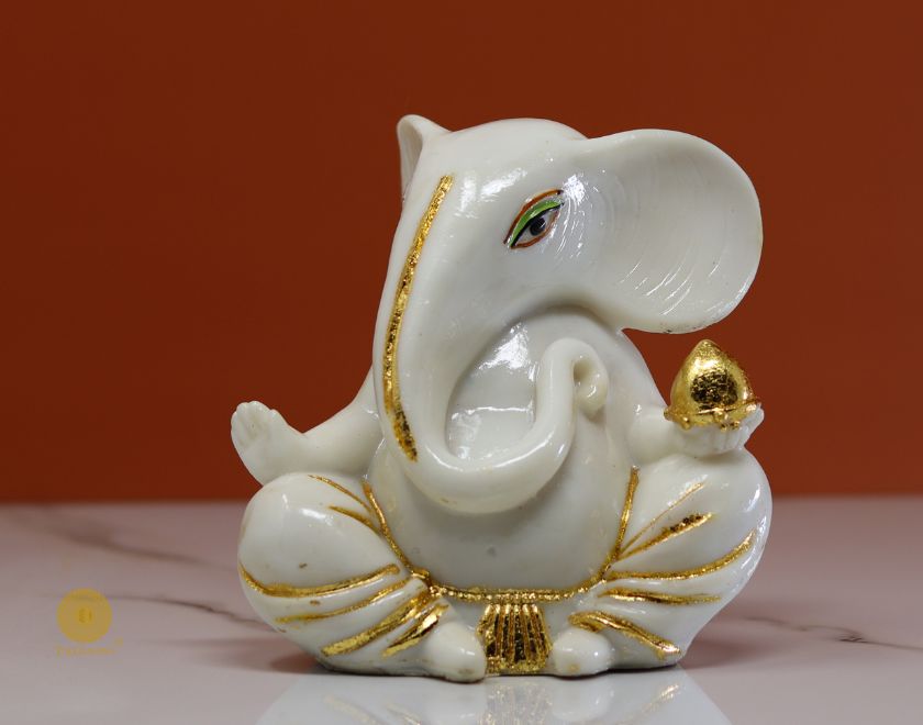 Left-side view of The Gharnish Vaastu Ganesha Gods Figurine, detailed Hindu deity statue with traditional design.
