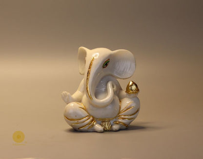 Left side view of The Gharnish Vaastu Ganesha statue, a detailed gods figurine with traditional design and intricate carvings.