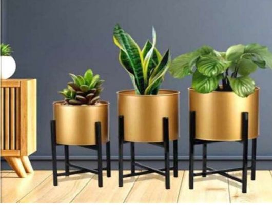 Set of three metal planters with stand by The Gharnish, ideal for home or office decor and plant display.