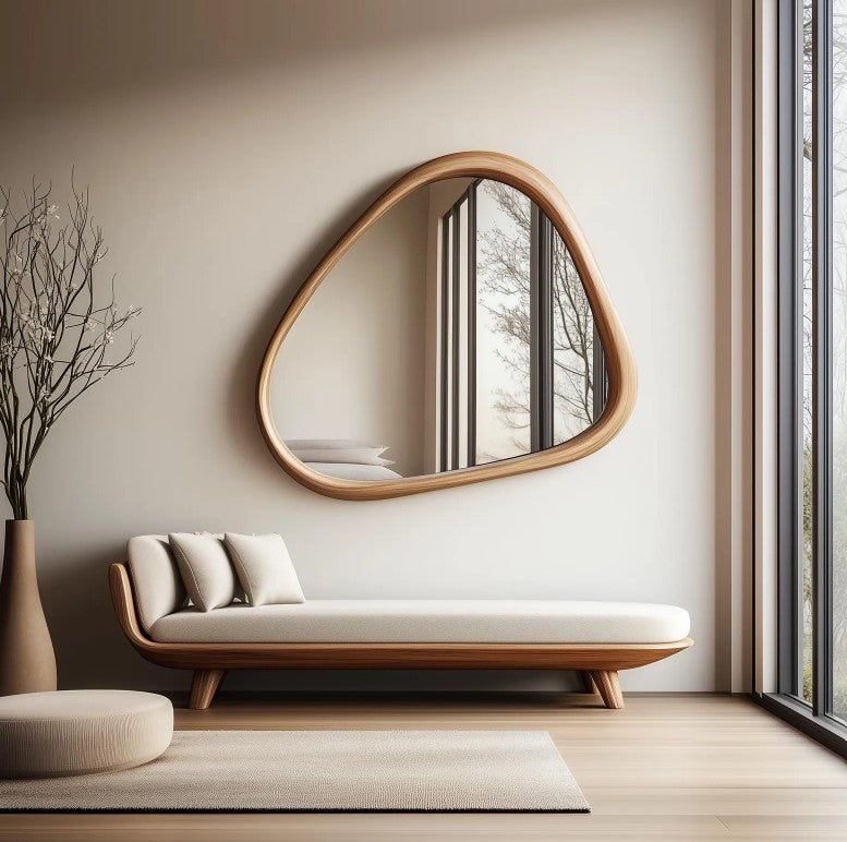 Modern living room mirror with an asymmetric wood frame, designed for home decor by The Gharnish, premium art gallery style.