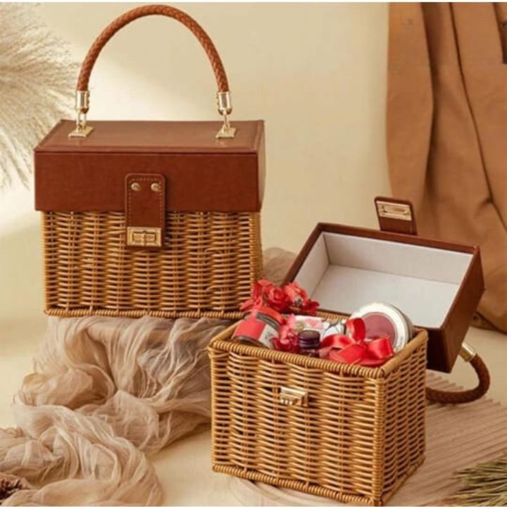 Small leather and rattan storage basket by The Gharnish, ideal for organizing souvenirs or small household items.