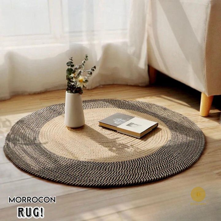 Colorful Moroccan rug used as stylish storage or decorative piece, featuring intricate patterns and vibrant textiles by The Gharnish.