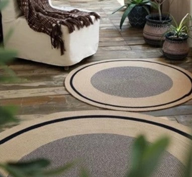 Colorful Moroccan rug used as stylish storage solution by The Gharnish, showcasing intricate patterns and vibrant textile design.