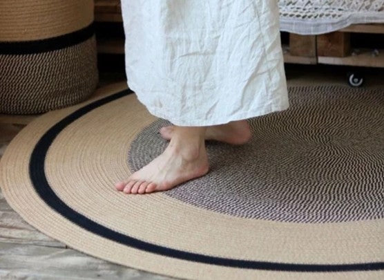 Stylish Moroccan rug from The Gharnish, featuring vibrant patterns and traditional design, used as decorative storage.