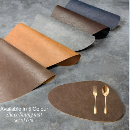 Modern leather heat-resistant and stylish table mats from The Gharnish, designed for elegant table setting and protection.