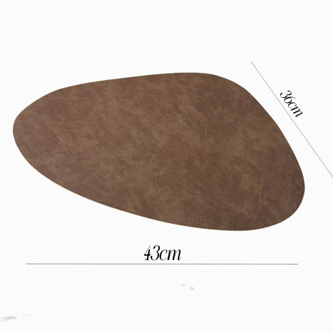 Modern leather table mats by The Gharnish, heat-resistant and stylish storage accessories for dining tables.