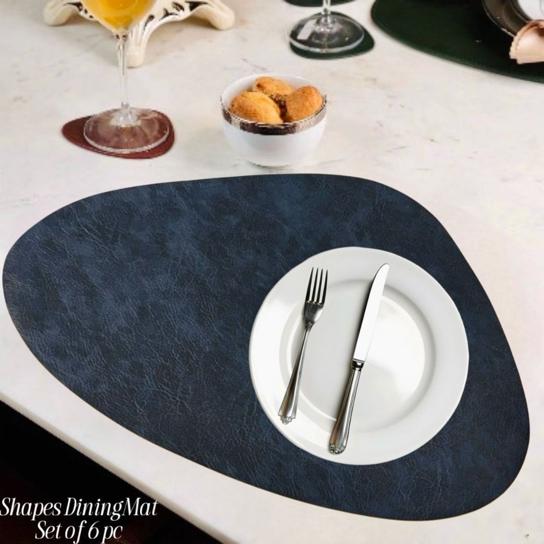 Modern leather table mats from The Gharnish, heat-resistant and stylish storage accessory for dining tables.