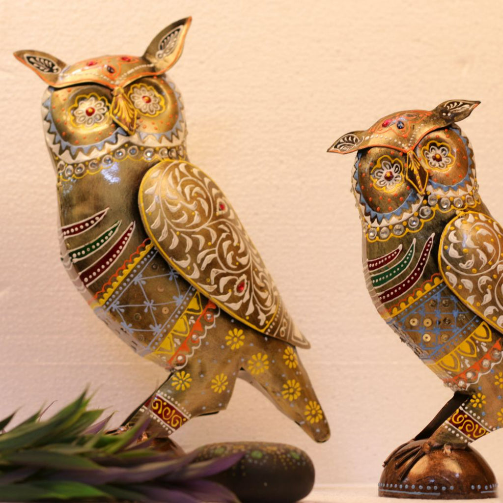 Set of two multicolor painted metal owl table top decor pieces by The Gharnish, decorative bird sculptures for home display.