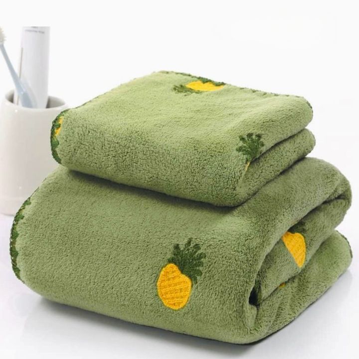 Embroidered full-size bath towel and hand towel combo by The Gharnish, featuring intricate embroidery and soft, absorbent fabric.