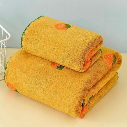 Embroidered full-size bath towel and hand towel set by The Gharnish, soft and plush with decorative embroidery details.