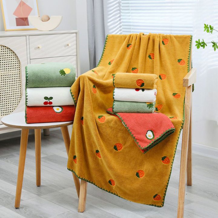 Embroidered full-size bath towel and hand towel combo by The Gharnish, featuring elegant design and soft, absorbent fabric.