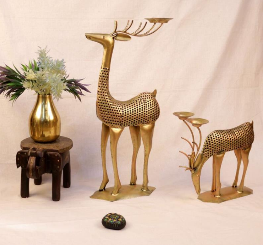 Antuque deer family candle holder showpiece from The Gharnish, traditional lights with detailed deer figures for home decor.