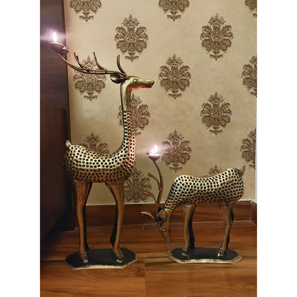 Antuque deer family candle holder showpiece by The Gharnish, traditional lights decor with detailed deer figures and warm candle holders.