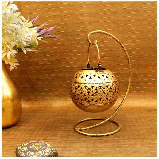 Iron stand with round tea light holder from The Gharnish, traditional lighting decor with a rustic metal design.