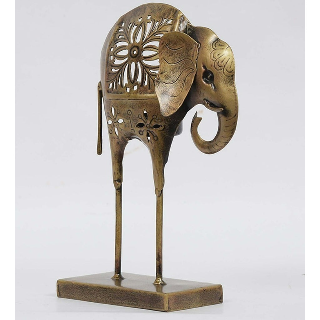 Metal T Light elephant figurine decor by The Gharnish, traditional lights with detailed elephant design for decorative illumination.