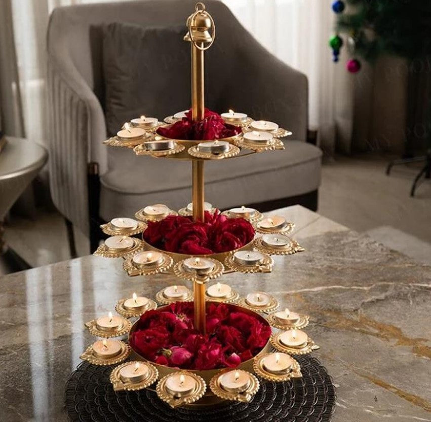 Deepak Urli 3 Tier Stand by The Gharnish, ornate metal urli with three decorative tiers for traditional home decor.