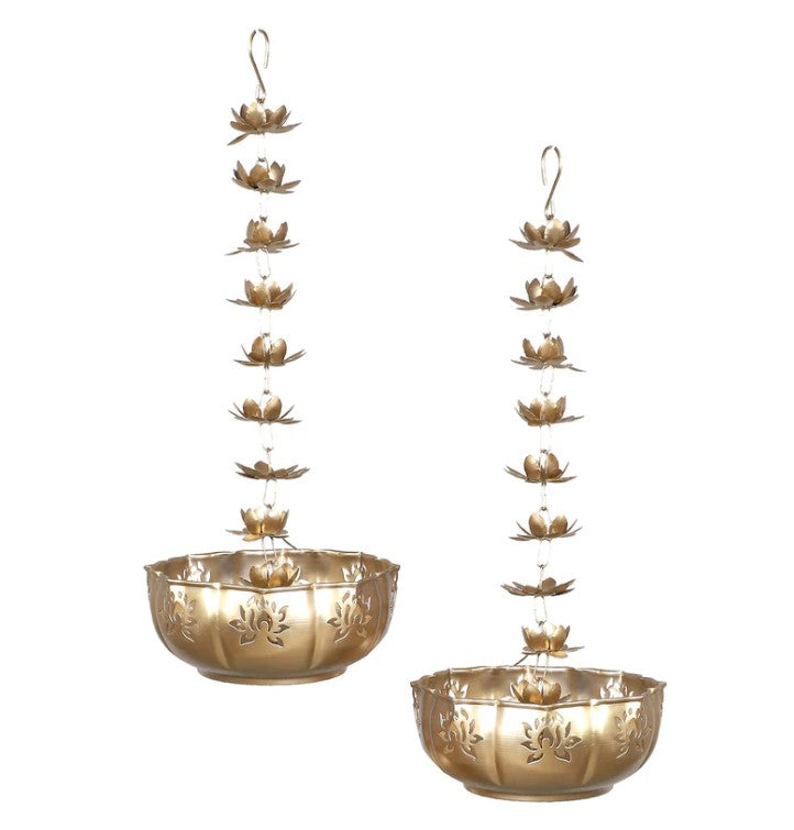 Hanging Lotus Urli set of 2 by The Gharnish, decorative metal bowls with lotus design, ideal for home decor or floral arrangements.