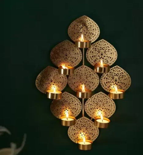 Wall-mounted decorative T-light holder urli by The Gharnish, featuring a stylish design for ambient lighting and home decor.