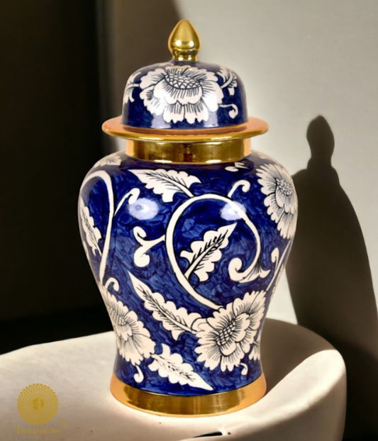 Decorative ceramic vase and ginger jar with intricate temple-themed designs by The Gharnish, perfect for tabletop decor.