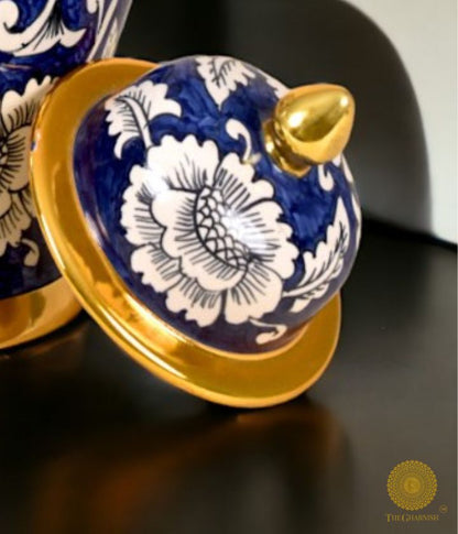 Decorative ceramic ginger jar vase with intricate temple-inspired design, perfect for tabletop decor by The Gharnish.