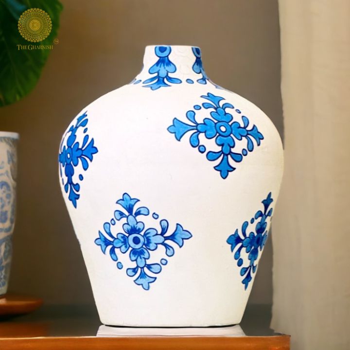 Oversized hand-painted ceramic blue pottery vase featuring intricate designs, perfect for decorative display.