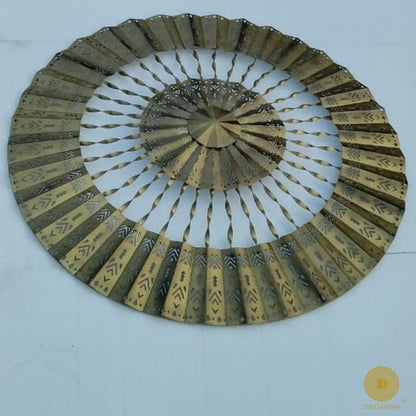 Metallic rings of lights wall art by The Gharnish, 30-inch modern wall decor with reflective, circular metal design.