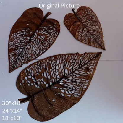 Three metal leaf wall art pieces in 30, 24, and 18-inch sizes by The Gharnish, featuring intricate leaf designs for wall decor.