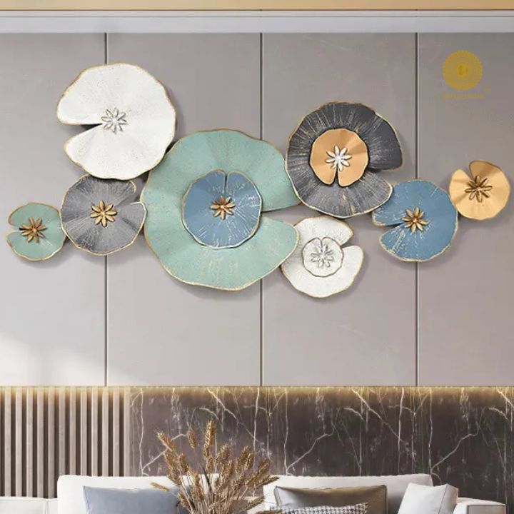 Metallic flower wall art by The Gharnish, 48x24 inches, showcasing eight intricate floral metal designs on a wall.