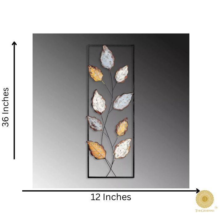Metallic leaf wall art by The Gharnish, 12x36 inches, featuring shiny gold and silver leaf design for modern home decor.